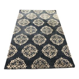 Empire Pottery Barn Scroll Area Rug - 4′11″ × 7′11″. Original Price: $749
