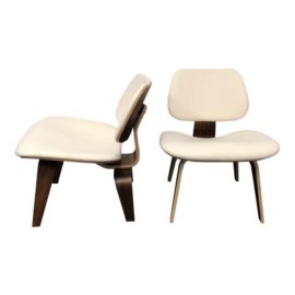 Herman Miller Eames Upholstered Molded Plywood Dining Chairs- a Pair. Original Price: $4,268.00