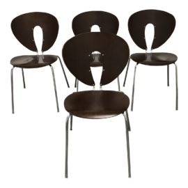 Set of Four Design Within Reach Walnut Global Chairs. Original Price: $1,580.00