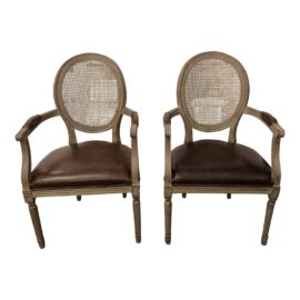 Pair of Restoration Hardware Vintage French Round Leather Armchair. Original Price: $1,530