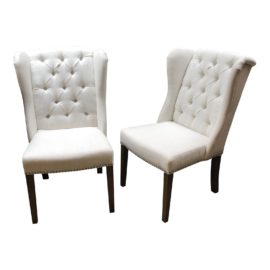 Pair of Tufted Wingback Chairs. Original Price: $900