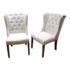 Pair of Tufted Wingback Chairs. Original Price: $900