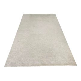 Savnik Custom Ivory Wool Shag Rug - 10′3″ × 16′6″. Original Price: $10,000