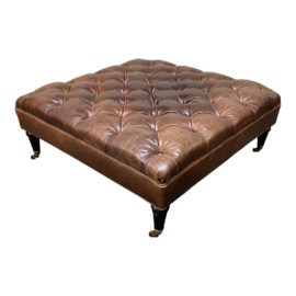 Tufted Distressed Leather Ottoman.