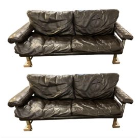 Pair of Pfieff & Co. Uk Mandarin Leather Two Seater Sofs