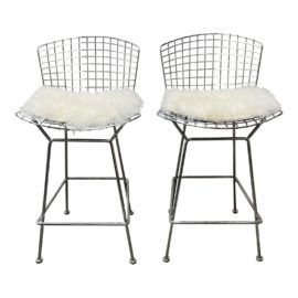 Knoll Harry Bertoia Counter Stools + Fur Seat Pads - a Pair. Original Price: $3,850