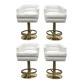 Essential Homes Russel White Leather Swivel Counter Stools - Set of Four. Original Price: $13,480