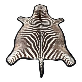 Zebra Hide Rug With Felt Backing - 6′2″ × 9′1″. Original Price: $4,419
