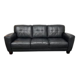 Macy's Kaleb Blind Tufted Navy Leather Sofa. Original Price: $1,300
