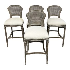 Aidan Gray Chelsea Cane Bar Stools - Set of Four. Original Price: $3,600