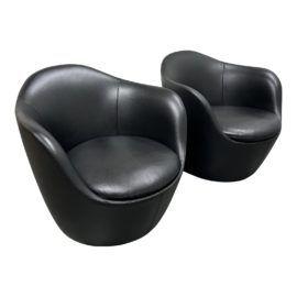 Design Within Reach Lina Swivel Chairs in Black Pebbled Leather, a Pair. Original Price: $7,190