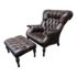 Stickley Leopole's Tufted Leather Chair + Ottoman. Original Price: $7,500