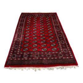 Vintage Pakistani Bokhara Handknotted Area Rug - 6′5″ × 9′9″. Original Price: $2,700