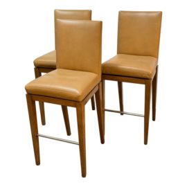 A. Rudin Custom No. 647 Leather Swivel Barstools, a Set of Three. Original Price: $7,000