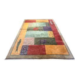 8ft8in × 11ft8in Tufenkian Paintbox Lagoon Tibetan Wool Area Rug. Original Price: $2,200