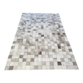 5ft11in × 8ft11in Cb2 Blanchette Hide Patchwork Area Rug. Original Price: $900
