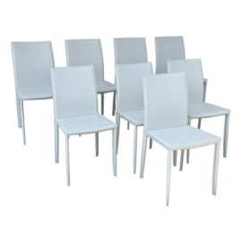 Actona Faux Leather Dining Chairs, a Set of 8. Original Price: $1,800