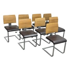 Volgauer Vita Cantilever Dining Chairs, Set of Eight. Original Price: $7,900
