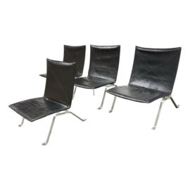 Fritz Hansen for Design Within Reach Black Leather Easy Chairs, Set of Four. Original Price: $32,000