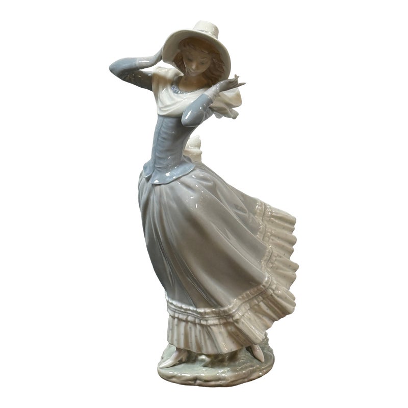 Lladró Spring Breeze Porcelain Figurine, Signed. Estimated Price