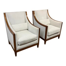 French Modernist Slope Arm Lounge Chairs, Pair. Estimated Price: $7,000