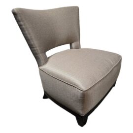 A. Rudin Slipper Chair, Model 642. Estimated Cost: $5,000