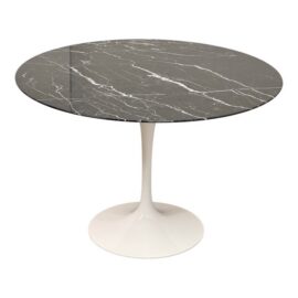 Eero Saarinen for Knoll Saarinen Round Dining Table. Estimated Price: $5,781