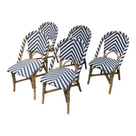 Serena&Lily Riviera Rattan Dining Side Chairs, Set of Five. Original Price: $1,970