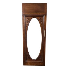 Ornately Carved Wood Door With Beveled Oval Glass
