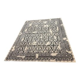 8ft × 10ft Pottery Barn Elva Hand Tufted Area Rug. Estimate Price: $1,200