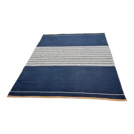 7ft 7in × 10ft 1 in Serena & Lily Signature Cotton Dhurrie Rug. Estimate Price: $1,200