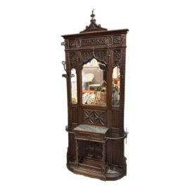 French Gothic Revival Carved Oak Mirrored Hall Tree. Estimated Price: $10,000