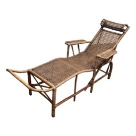 Antique Chinese Bamboo Reclining Chair. Estimated Price: $1,850